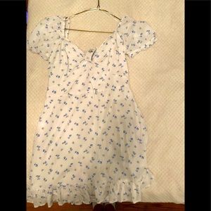 This is a Hollister dress has a floral print and blue and white color.